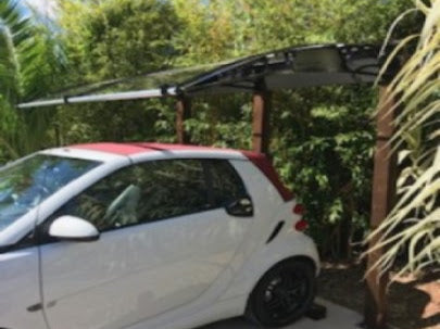 A customer creatively cover a car soft top with a Canofix door canopy.