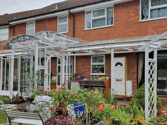 Elegant and Stylish Conservatory and Patio space cover with Canofix door canopy