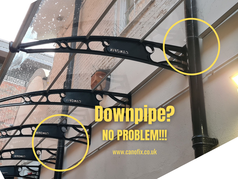 How to install a canopy on a wall that has a down pipe?